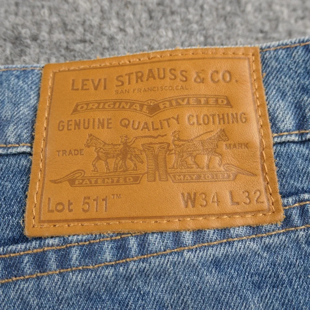 Levis Premium 511 Mens Jeans 34x32 Blue Slim Patchwork Print Distressed Stretch